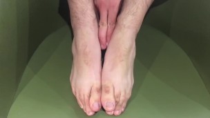 Manlyfoot - The green chair - Aussie guys size 11 1/2 feet on display in work trip hotel room