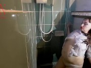 A chick in clothes under the shower. Wet panties, wet trousers, wet shirt. Full 12/16