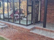 Bikini slut pissing from a balcony