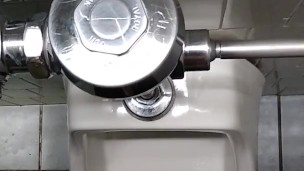 Stud takes piss on UCSB campus bathroom (again)