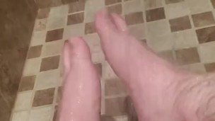 Playing with feet in the shower