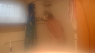 Getting cleaned up in the shower after getting very muddy and dirty