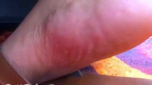 Feet flip flop play under bed