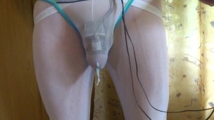 Estim e-stim electro cumming with chastity cage through panties
