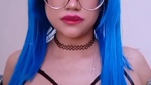 Little succubus plays with her tits 