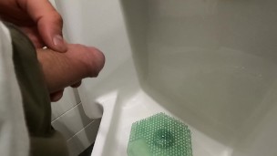 peeing at urinal
