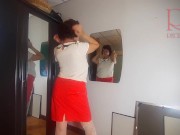 A naked lady does make-up in front of a mirror, puts on underwear, stockings, a skirt. 3 8/16