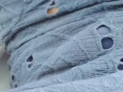 Smoking in public, while rolling blunt.