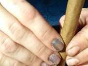 Smoking in public, while rolling blunt. 9/16