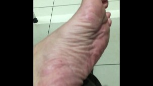 Public toilet in shopping centre - Got horny decided to go fishing for someone to suck my toes off