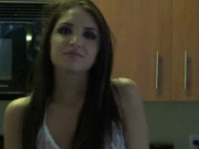 Nick Jacobs convinces his girlfriend, Giselle Leon, to try out his new camera 1/16