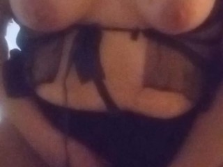 Horny milf rubs titties wearing lingerie