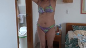 Latina mature shows off on the beach and has sex with the hotel guard, big cumshot on her hairy puss