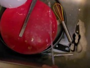 Desperate piss all over the dirty dishes before washing them