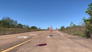Stripping naked on a public road and jacking off before getting dressed again.