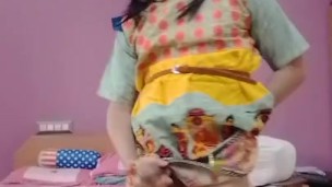 Cute crossdresser femboy in a cute dress playing with her big dick.