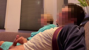 Casual handjob from wife while watching tv on couch