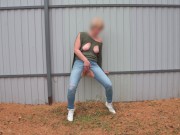 pissing with a powerful stream on the street by the fence 4K 3/16