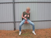 pissing with a powerful stream on the street by the fence 4K 8/16