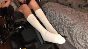 Quadriplegic Feet Shaking In White Socks