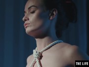 Kinky bondage beauty is all tied up as she masturbates avidly 3/16