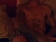 Hot Tattooed guy Jerks off himself  teasing his MILF wife filming him. 