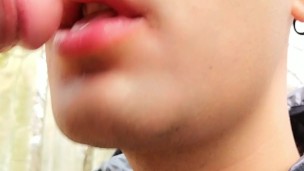 Licking last drops of cum from cock after getting facial outdoor