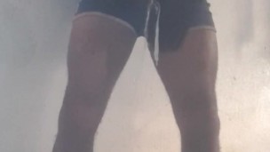 Uncut farm lad in blue shorts pissing