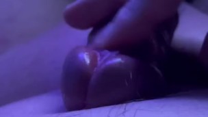 Close-up playing with frenulum until CUM SHOT