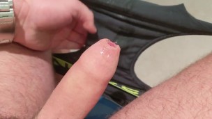 Wanking my thick uncut cock at public toilet and shooting my load all over my underwear