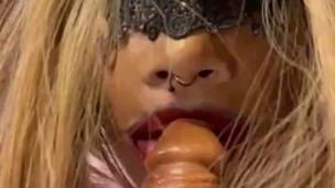 Sissy sucking huge dildo
