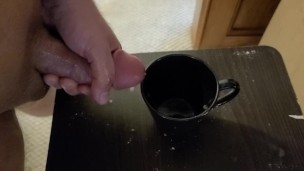 Filling a cup with cum part 2