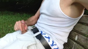 Cumming on the public park bench