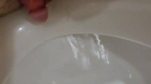 Boy Pussy fucks pushs the edge of public men toilet, rubbing clit on toilet 