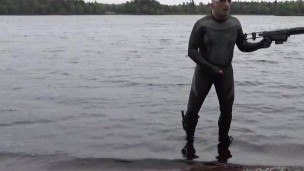 horny silicone masked exhibitionist has quick cum in lake