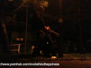 She drinks piss and cum in a public park while traffic passes 15/16