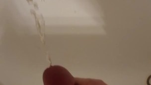 Stroking and pissing all over my shower/myself 