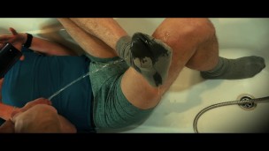 I piss on my friend, who is in his underpants, and then he sucks my dick. Pissed off clothes