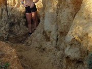 Hot brunette risks masturbating on a public beach while doing her exercise 6/16