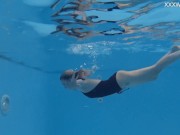 Finnish cutest blonde teen Mimi Cica touches her body in the pool 9/16