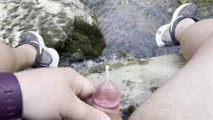Sitting on a stone next to a stream in a national park in Turkey