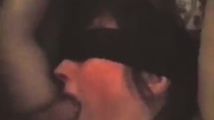 Hands tied down. I shove my cock down her throat 
