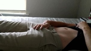 Rubbing myself through my pants, then pulling out my hard cock!