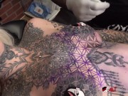 Sascha plays with Amber Luke while she gets tattooed 5/16