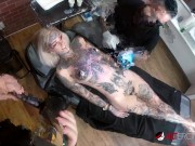 Sascha plays with Amber Luke while she gets tattooed 7/16