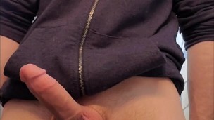 Twinky guy flexing cock in the bathroom