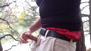 Pounding my pud in the forest and cumming up against a tree. Jerking off by the water.