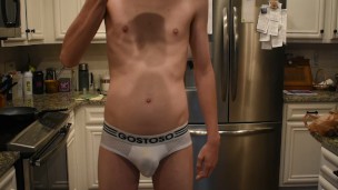 Skinny young twink rehydrates his belly full of rice and soda