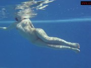 Babes swim and get horny underwater Mia and Lina 15/16