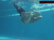 Babes swim and get horny underwater Mia and Lina 9/16